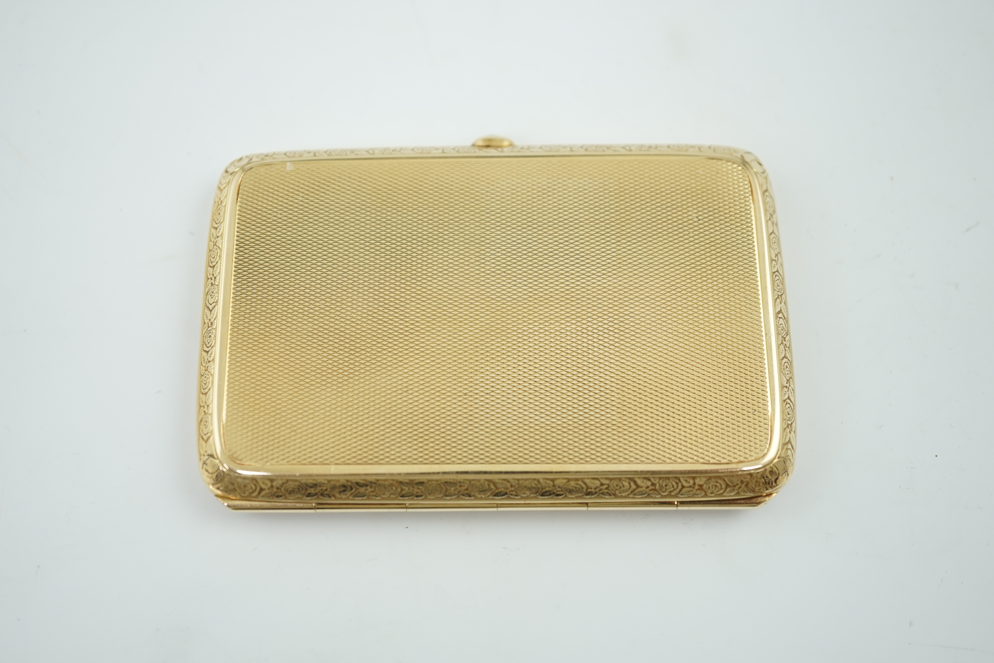 A 20th century engine turned 14k gold cigarette case